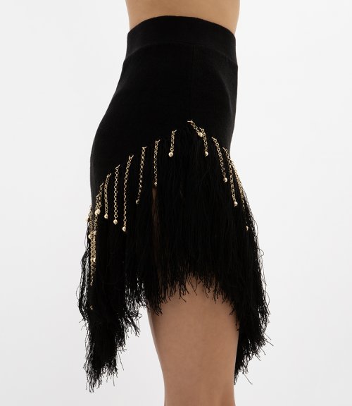 WOVEN SKIRT WITH KNITTED BEADS AND FEATHERS