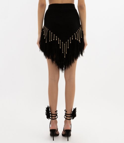 WOVEN SKIRT WITH KNITTED BEADS AND FEATHERS